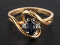 A navette-shaped sapphire and diamond three-stone ring,: stamped '14K', length of ring head ca. 1.
