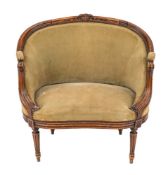 A carved beech and upholstered bergere in 18th century taste, early 20th century,