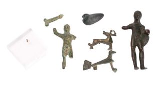 A Roman bronze brooch: in the form of a stag, with traces of enamel,