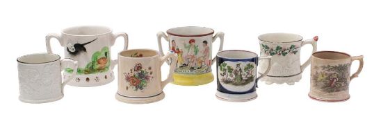 A group of seven 19th and 20th century frog loving-cups and mugs: with coloured transfer and