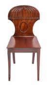 A Regency mahogany hall chair, in the manner of Gillow, circa 1815,