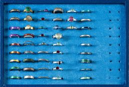 A collection of fifty one spacer rings,: with vari-coloured enamel and gemstones including,