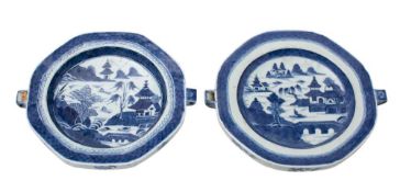 A matched pair of Chinese blue and white octagonal warming dishes: painted with traditional pagoda