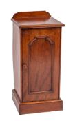 A Victorian mahogany pot cupboard, third quarter 19th century,: the top with shaped back gallery,