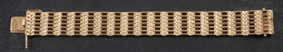 A 9ct gold gate-link bracelet,: with import marks for London, 1965, length ca. 18.