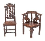 A Victorian carved oak corner elbow chair in baroque style, late 19th century,