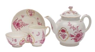 A First Period Worcester teapot and cover and a matched trio: painted in puce monochrome with
