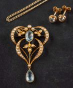 An Art Nouveau seed pearl and aquamarine pendant,: total estimated aquamarine weight ca. 1.