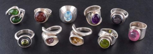Ten gemset rings,: including pink tourmaline, amethyst, moonstone and peridot, eight stamped '925',