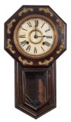 An American drop dial wall clock: the eight-day duration movement striking on a gong,