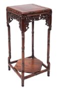 A Chinese hardwood miniature urn stand: with square top and pierced foliate apron,