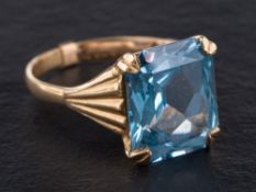 A 9ct gold, synthetic blue spinel ring,: with hallmarks for London, 1968, length of ring head ca.
