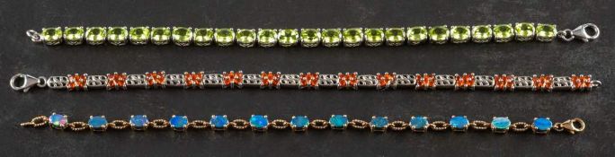 Three gemset bracelets,: including a black opal triplet bracelet, stamped '9K', weight ca. 4.
