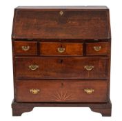 A George III oak bureau, circa 1770,