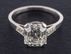 An octagonal step-cut diamond ring,: estimated weight of principal diamond ca. 2.
