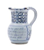 A Liverpool polychrome delftware puzzle jug: of conventional form with pierced cylindrical neck and