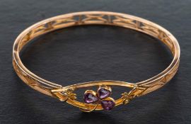 A clover leaf, heart-shaped amethyst and seed pearl bangle,: inner diameter ca. 7.