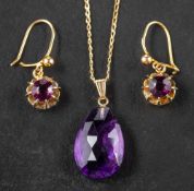 A briolette-cut amethyst pendant,: the pendant stamped '14K', length ca. 2.