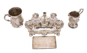 A Victorian silver mug, maker Robert Harper, London, 1860: inscribed, of baluster form,