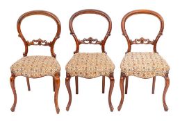 Six Victorian walnut balloon back dining chairs:,