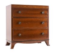 An apprentice's miniature mahogany chest of drawers: the crossbanded and boxwood strung rectangular