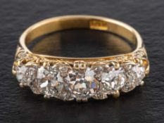 A cushion and old-cut diamond, five stone ring,: estimated total diamond weight ca. 2.