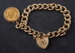A 9ct gold curb-link bracelet and heart-shaped clasp with a George V full gold sovereign coin fob,