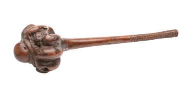 A Fijian mace-headed throwing club (Ula Tavatava): the handle with incised geometric decorated grip,