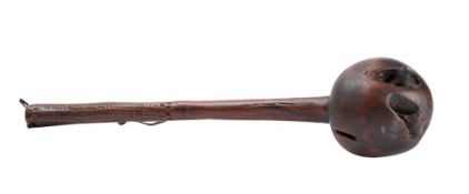 A Southern African hardwood knobkerrie: of traditional design, with bulbous ball head,