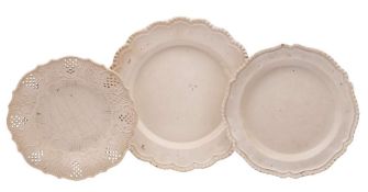 Two large Staffordshire white saltglaze serving dishes and one other: the first two with shaped