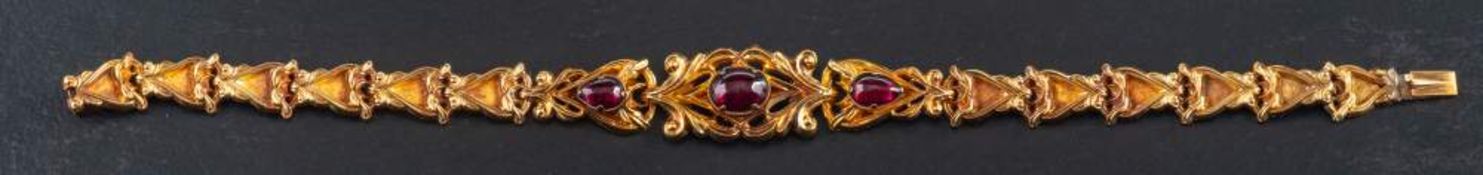 A Victorian, gold, gemset, fancy-link bracelet,: set with foiled-back, cabochon-cut gemstones,