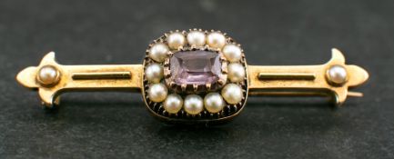An amethyst and seed pearl bar brooch,: length of brooch ca. 4.6cm, total weight ca. 5.6gms.