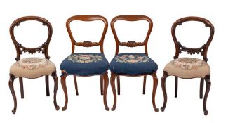 A pair of Victorian carved mahogany 'balloon back' side chairs, circa 1870,