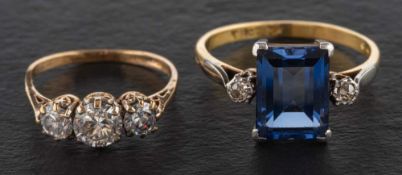 Two gem-set rings,: including a synthetic sapphire and single-cut diamond three-stone ring,
