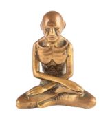 A bronze figure of nude seated figure: 7.5cm high.