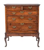 A George III oak chest on stand, circa 1770 and later,