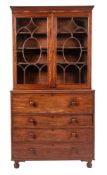 A Regency mahogany and glazed secretaire bookcase, circa 1815,