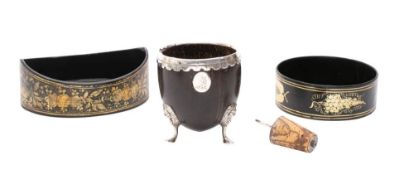 A late 18th/early 19th century silver mounted coconut cup:, crested,
