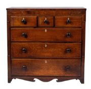 A late George III oak, marquetry and chequer banded chest of drawers, circa 1800,
