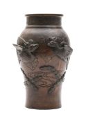 A Japanese bronze vase: of ovoid form decorated in low relief with exotic birds amongst foliage,