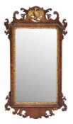 A mahogany and parcel giltwood framed rectangular wall mirror in George I style, 19th century,