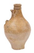 A salt glazed stoneware flagon: 17th century, 21.5cm high, devoid handle.