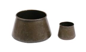 A Persian brass food vessel: of conical form with banded Islamic script decoration,