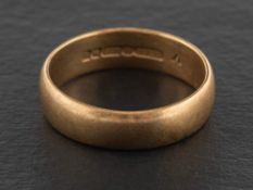 A 9ct gold band ring,: with hallmarks for Birmingham, 1994, ring size U, total weight ca. 5.2gms.