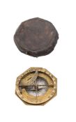 An early 18th century brass combination compass sundial by L Grafs: the octagonal case with