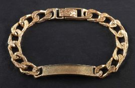 A 9ct gold, textured curb-link bracelet with plain frontispiece,: with indistinct hallmarks,