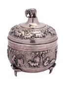 An Indian silver jar and cover: of circular outline, with domed cover having an elephant finial,