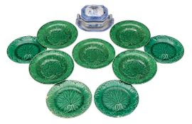 A set of five 19th century green-glazed majolica cabbage leaf moulded deep plates,