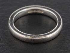 A platinum band ring,: with partial hallmarks for London, ring size K, total weight ca. 4.