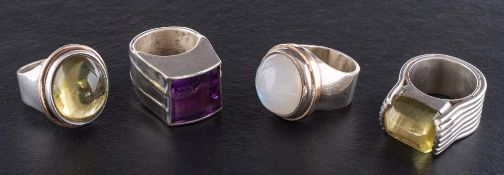Four gemset rings,: including moonstone, amethyst and peridot, ring sizes O-R, total weight ca. 99.